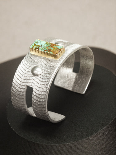 Bracelet: Turquoise center stone, silver
